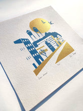 Load image into Gallery viewer, Modern minimal art print of Lake Avenue, Canal Park MN. Blue &amp; gold ink. titled, numbered and signed. Flat lay view
