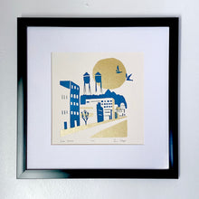 Load image into Gallery viewer, Modern minimal art print of Lake Avenue, Canal Park MN. Blue &amp; gold ink. titled, numbered and signed. front view with black frame
