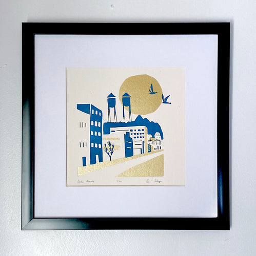Modern minimal art print of Lake Avenue, Canal Park MN. Blue & gold ink. titled, numbered and signed. front view with black frame